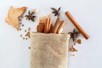 Cinnamon,Stick,And,Dried,Ginger,In,Sack,With,Spices